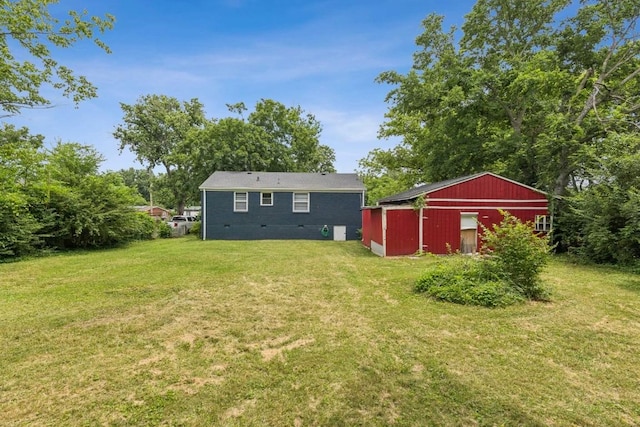 3721 Wharton Dr, Nashville, TN 37211 - back of house with a lawn, crawl space, and an outbuilding