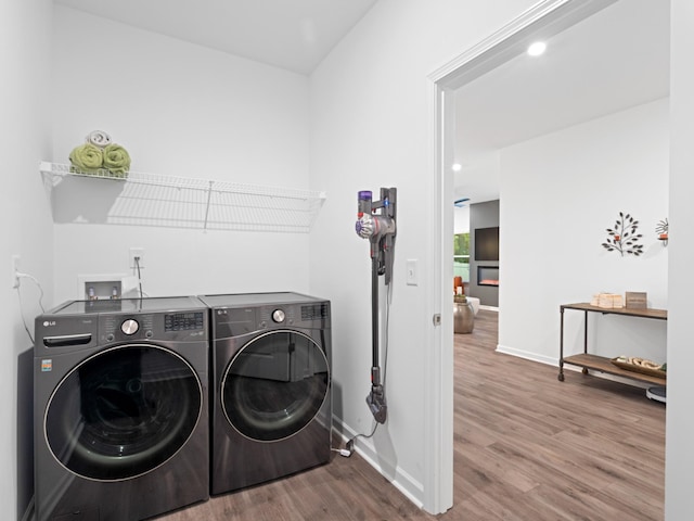 345 Winston Way, Gallatin, TN 37066 - laundry area with washer and dryer and wood finished floors