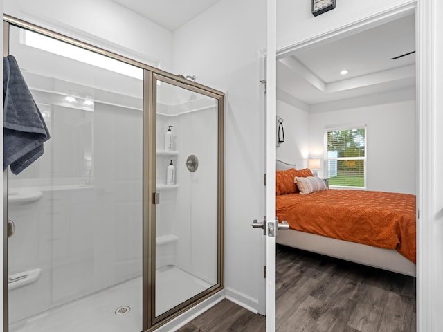 345 Winston Way, Gallatin, TN 37066 - ensuite bathroom with wood finished floors, a stall shower, and a tray ceiling