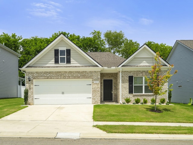 345 Winston Way, Gallatin, TN 37066 - craftsman-style house featuring driveway, a front yard, an attached garage, brick siding, and a shingled roof