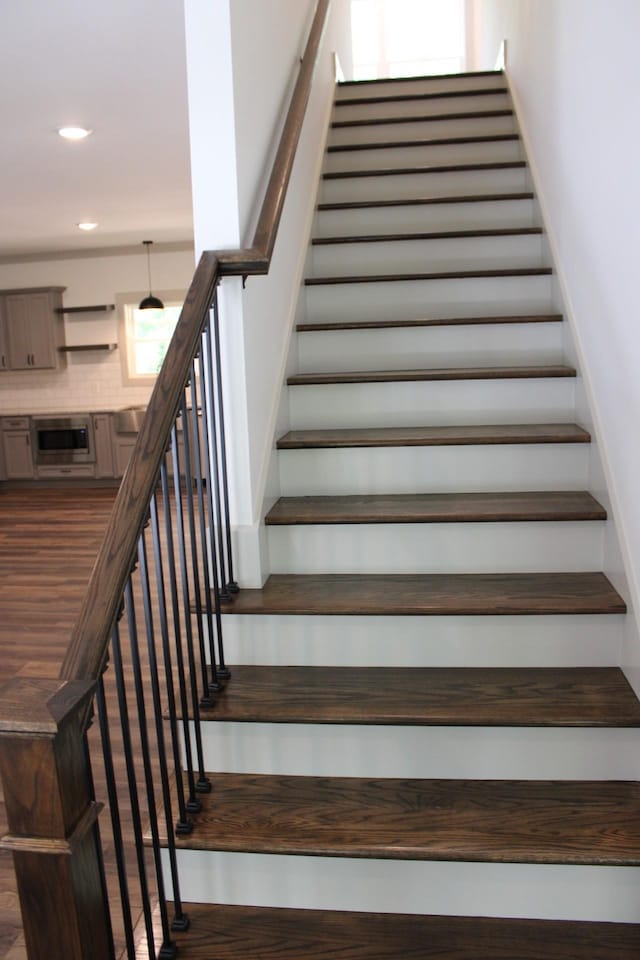 807 Hasty Ln, Estill Springs, TN 37330 - stairway with wood finished floors and recessed lighting