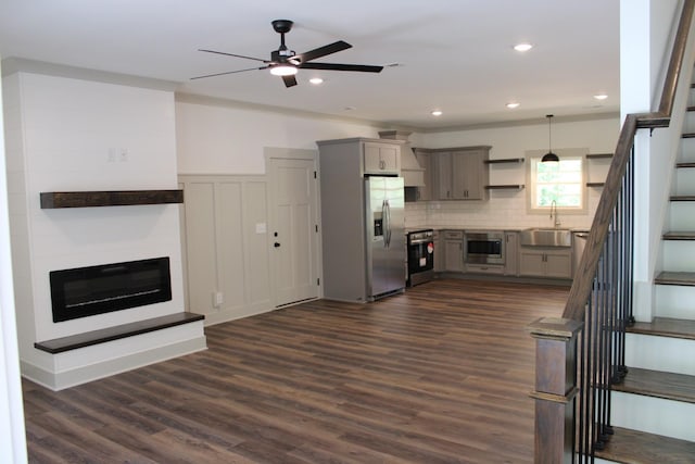 807 Hasty Ln, Estill Springs, TN 37330 - kitchen with stainless steel fridge with ice dispenser, gray cabinetry, open shelves, ceiling fan, and dark wood-style floors