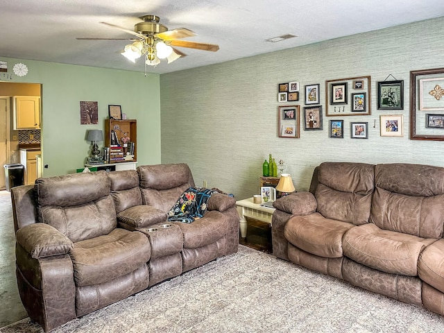 1097 Taylor Ln, Newbern, TN 38059 - carpeted living area with ceiling fan and wallpapered walls