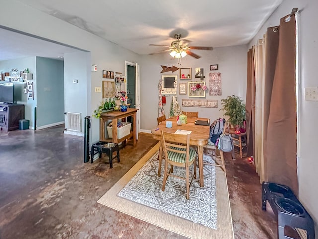 1097 Taylor Ln, Newbern, TN 38059 - dining room with a ceiling fan and finished concrete flooring