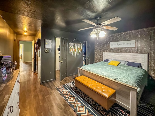 1097 Taylor Ln, Newbern, TN 38059 - bedroom with wood finished floors and a ceiling fan