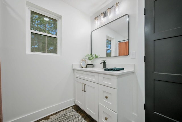 704 Pond Rd, Dickson, TN 37055 - bathroom with vanity and wood finished floors