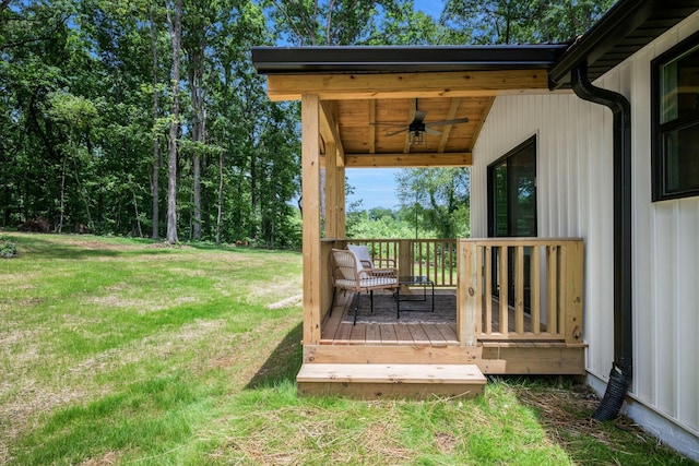704 Pond Rd, Dickson, TN 37055 - deck featuring ceiling fan and a lawn