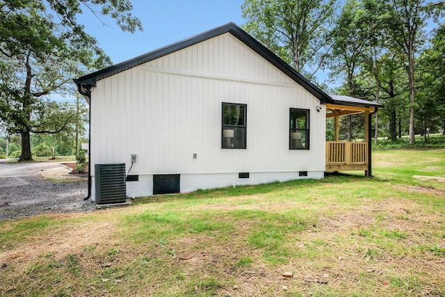 704 Pond Rd, Dickson, TN 37055 - view of side of property with a cooling unit and a lawn