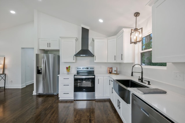 704 Pond Rd, Dickson, TN 37055 - kitchen with appliances with stainless steel finishes, wall chimney range hood, light countertops, white cabinetry, and recessed lighting
