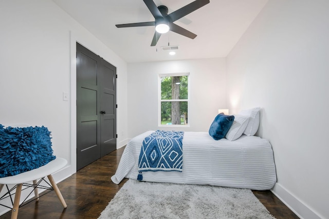 704 Pond Rd, Dickson, TN 37055 - bedroom with dark wood-style flooring and a ceiling fan