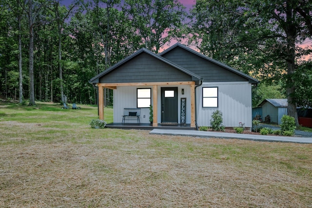 704 Pond Rd, Dickson, TN 37055 - modern inspired farmhouse with covered porch and a front lawn