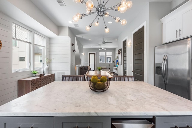 2410 Meharry Blvd Unit 3, Nashville, TN 37208 - kitchen featuring stainless steel fridge with ice dispenser, gray cabinetry, a kitchen island, light stone counters, and recessed lighting