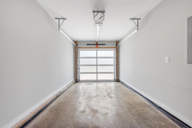 2410 Meharry Blvd Unit 3, Nashville, TN 37208 - garage featuring a garage door opener and baseboards