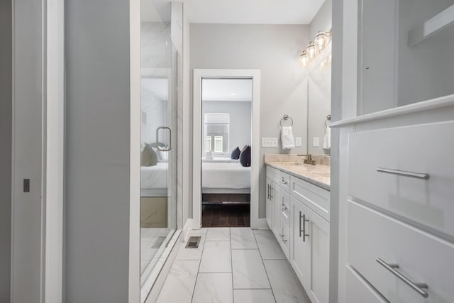 2410 Meharry Blvd Unit 3, Nashville, TN 37208 - ensuite bathroom featuring marble finish flooring, double vanity, and a marble finish shower