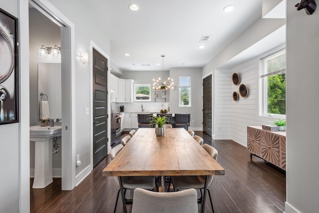 2410 Meharry Blvd Unit 3, Nashville, TN 37208 - dining area featuring recessed lighting, dark wood-style flooring, a chandelier, and wood walls