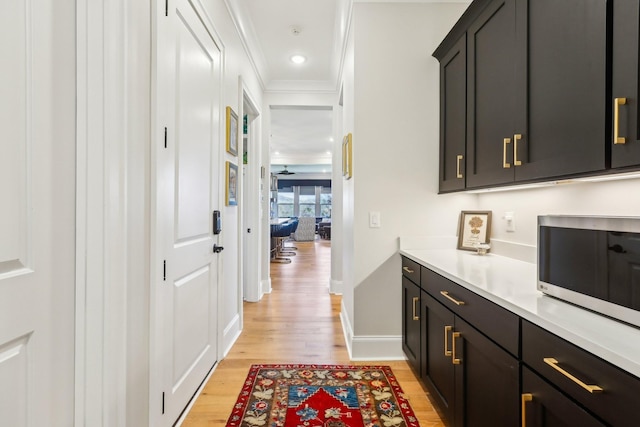 6004 Lookaway Cir, Franklin, TN 37067 - hallway featuring light wood finished floors and ornamental molding