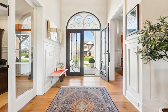 6004 Lookaway Cir, Franklin, TN 37067 - entrance foyer featuring a decorative wall, light wood-type flooring, plenty of natural light, and french doors