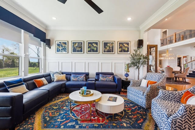 6004 Lookaway Cir, Franklin, TN 37067 - living room featuring a ceiling fan, crown molding, a decorative wall, a wainscoted wall, and recessed lighting