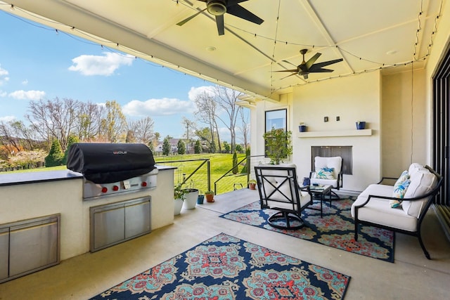 6004 Lookaway Cir, Franklin, TN 37067 - view of patio / terrace with exterior kitchen, ceiling fan, and an outdoor living space with a fireplace