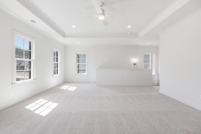 7018 Southvale Blvd, Franklin, TN 37064 - empty room with a tray ceiling, ornamental molding, light colored carpet, a ceiling fan, and recessed lighting