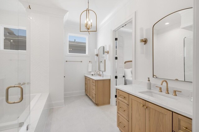 7018 Southvale Blvd, Franklin, TN 37064 - full bath featuring a shower stall, two vanities, a chandelier, and a bath