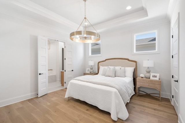 7018 Southvale Blvd, Franklin, TN 37064 - bedroom with a chandelier, a raised ceiling, light wood-style floors, multiple windows, and recessed lighting