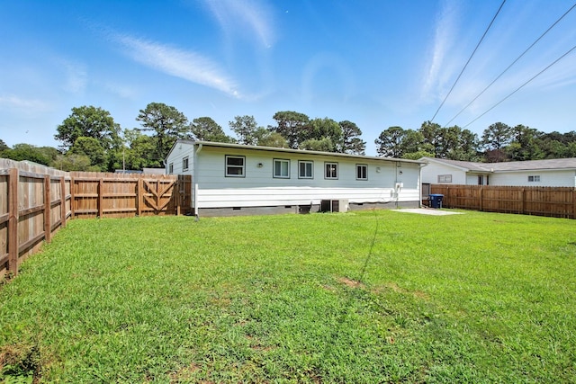 5011 Jarrett Rd, Chattanooga, TN 37416 - rear view of house with a fenced backyard and crawl space