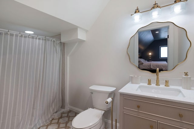 1744 Blackburn Ln, Spring Hill, TN 37174 - ensuite bathroom featuring vanity, curtained shower, and vaulted ceiling