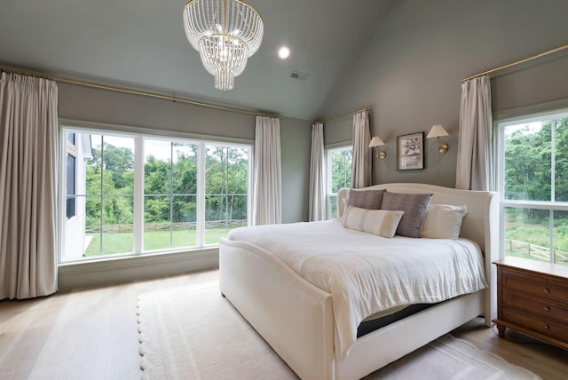 1744 Blackburn Ln, Spring Hill, TN 37174 - bedroom with a chandelier, multiple windows, wood finished floors, high vaulted ceiling, and recessed lighting