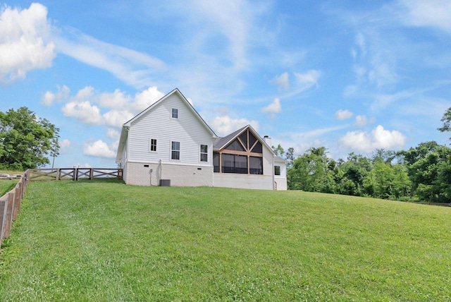 1744 Blackburn Ln, Spring Hill, TN 37174 - rear view of house with a sunroom and a chimney