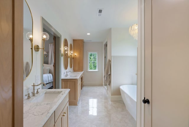 1744 Blackburn Ln, Spring Hill, TN 37174 - full bathroom with a freestanding bath, two vanities, and marble finish floors