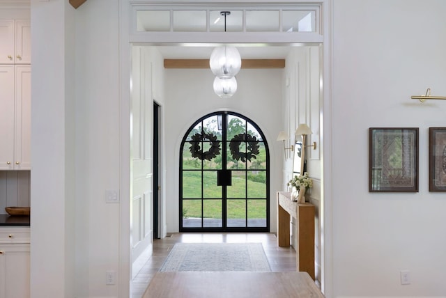 1744 Blackburn Ln, Spring Hill, TN 37174 - foyer entrance featuring beam ceiling and light wood-style floors