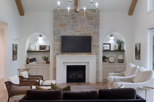 1744 Blackburn Ln, Spring Hill, TN 37174 - living room with beam ceiling, a chandelier, and a fireplace