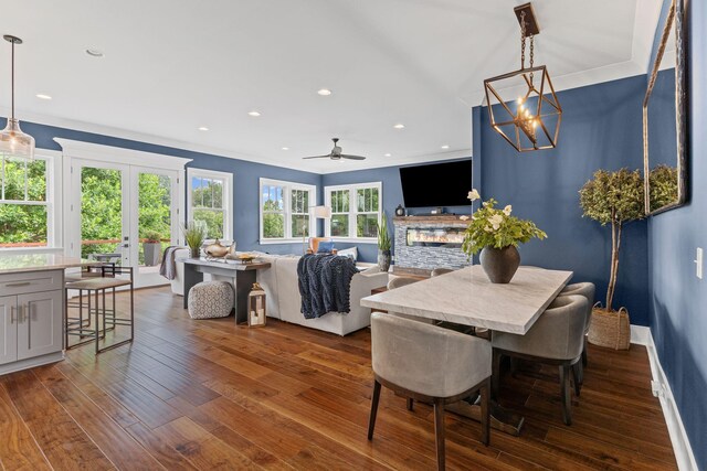 541 Lakeview Cir, Mount Juliet, TN 37122 - dining area with french doors, dark wood-style floors, a ceiling fan, recessed lighting, and a stone fireplace