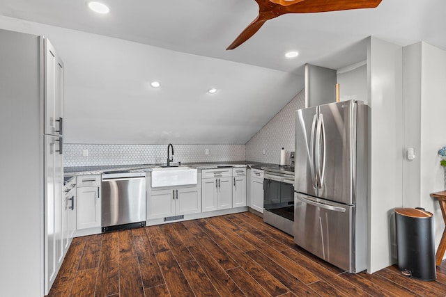 541 Lakeview Cir, Mount Juliet, TN 37122 - kitchen featuring appliances with stainless steel finishes, dark wood-style floors, decorative backsplash, ceiling fan, and light stone countertops