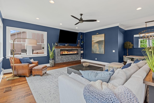 541 Lakeview Cir, Mount Juliet, TN 37122 - living room featuring wood finished floors, a fireplace, ceiling fan, recessed lighting, and crown molding