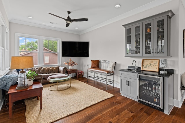 541 Lakeview Cir, Mount Juliet, TN 37122 - living room with wine cooler, wet bar, dark wood-style floors, a ceiling fan, and ornamental molding
