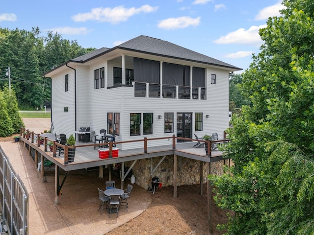 541 Lakeview Cir, Mount Juliet, TN 37122 - rear view of property featuring a deck, a shingled roof, and outdoor dining space