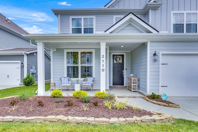 2110 Lequire Ln, Spring Hill, TN 37174 - view of front facade featuring covered porch and board and batten siding
