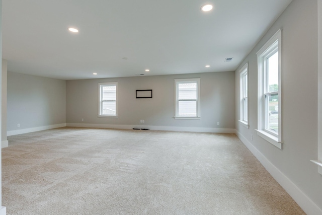 2110 Lequire Ln, Spring Hill, TN 37174 - spare room featuring light carpet, recessed lighting, and healthy amount of natural light