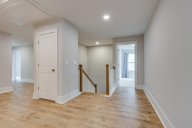 2110 Lequire Ln, Spring Hill, TN 37174 - hall with an upstairs landing, attic access, light wood finished floors, and recessed lighting