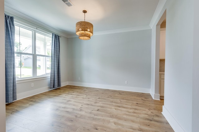 2110 Lequire Ln, Spring Hill, TN 37174 - spare room with light wood finished floors and ornamental molding