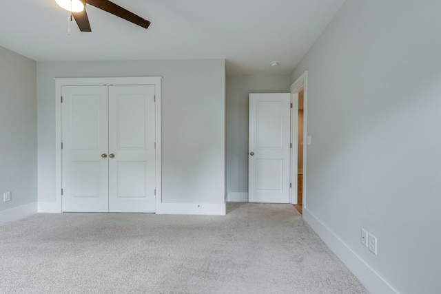 2110 Lequire Ln, Spring Hill, TN 37174 - unfurnished bedroom featuring carpet, a closet, and a ceiling fan