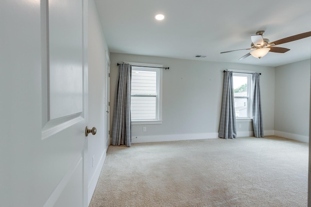 2110 Lequire Ln, Spring Hill, TN 37174 - spare room featuring light colored carpet, a ceiling fan, and recessed lighting