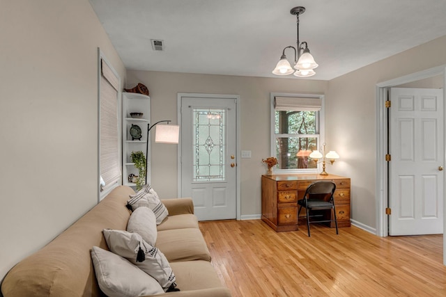 3316 Burr Rd, Springfield, TN 37172 - living area with a chandelier and light wood finished floors