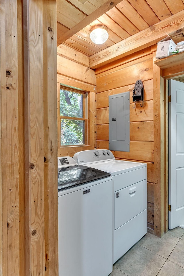 3316 Burr Rd, Springfield, TN 37172 - washroom with electric panel, separate washer and dryer, wood ceiling, light tile patterned floors, and wooden walls