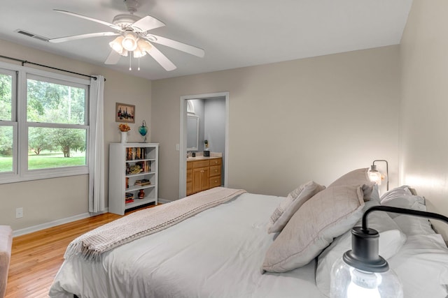 3316 Burr Rd, Springfield, TN 37172 - bedroom featuring light wood-style floors, a ceiling fan, and ensuite bath