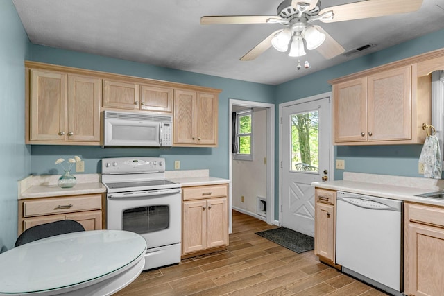 3316 Burr Rd, Springfield, TN 37172 - kitchen with white appliances, light brown cabinets, wood finished floors, and light countertops
