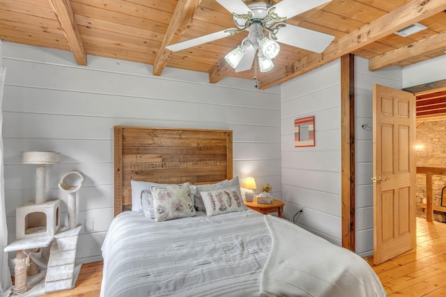 3316 Burr Rd, Springfield, TN 37172 - bedroom featuring a wooden ceiling with exposed beams, light wood-style floors, wooden walls, and a ceiling fan