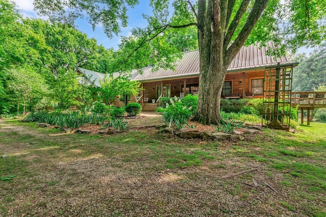 3316 Burr Rd, Springfield, TN 37172 - back of property with covered porch and a metal roof